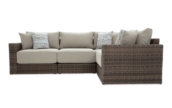 Modular Bob® 4 Piece Beige & Brown Wicker Outdoor Conversation Set with all-weather wicker, rust-proof aluminum frame, and beige polyester cushions in transitional style.
