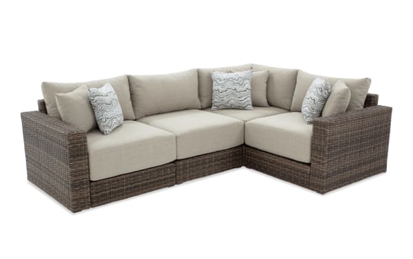 Modular Bob® 4 Piece Beige & Brown Wicker Outdoor Conversation Set with all-weather wicker, rust-proof aluminum frame, beige polyester cushions, and transitional style.