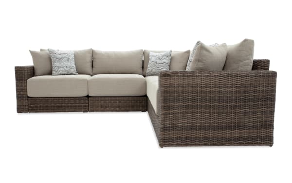 Modular Bob® 5 Piece Beige & Brown Wicker Outdoor Conversation Set with all-weather wicker, rust-proof aluminum frame, and beige polyester cushions in transitional style.