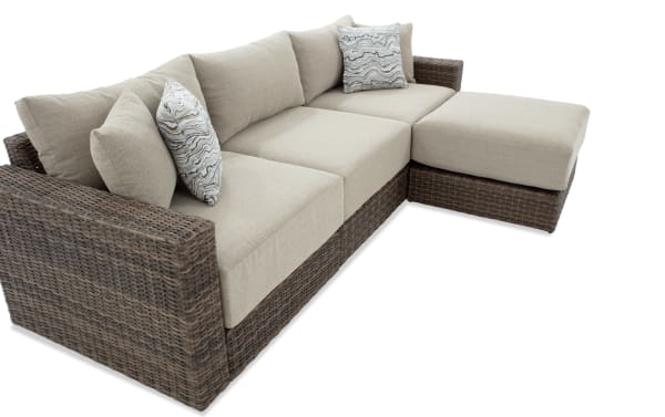 Modular Bob® 4 Piece Beige & Brown Wicker Outdoor Conversation Set with Ottoman, transitional style, all-weather wicker, rust-proof aluminum frame, beige polyester cushions with memory foam, versatile modular design for outdoor seating.