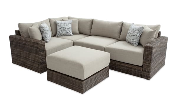 Modular Bob® 5 Piece Beige & Brown Wicker Outdoor Conversation Set with Ottoman featuring all-weather wicker, rust-proof aluminum frame, beige polyester cushions, and transitional style.