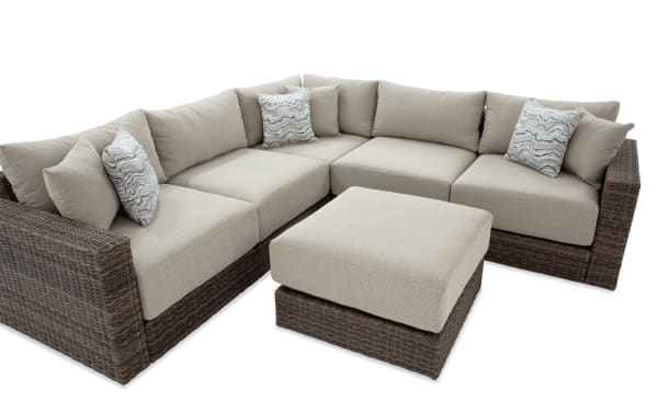 Modular Bob® 6 Piece Beige & Brown Wicker Outdoor Conversation Set with Ottoman, transitional style, all-weather wicker, rust-proof aluminum frame, beige polyester cushions with memory foam, versatile configuration for outdoor spaces.