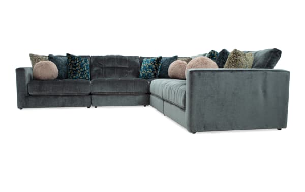 Emerald green Jewels 131" 5-piece modular sectional with plush polyester fabric, gel memory foam cushions, glam style, and mixed patterned accent pillows.
