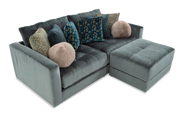 Emerald green Jewels 3-piece modular sectional with plush polyester fabric, gel memory foam cushions, accent pillows, and storage ottoman.