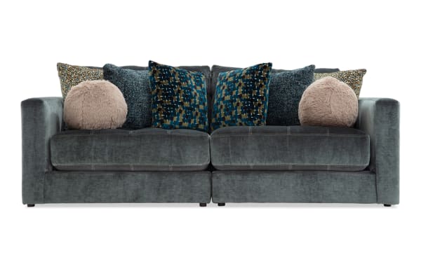 Emerald green Jewels 92" 2-piece modular loveseat with plush polyester fabric, glam style, gel memory foam cushions, and patterned accent pillows.