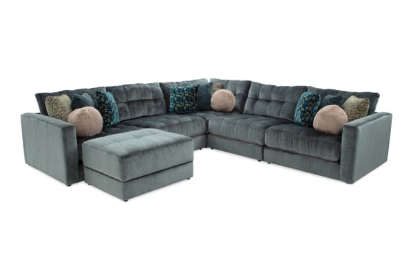 Emerald green Jewels 6-piece modular sectional sofa with plush polyester fabric, Bob-O-Pedic gel memory foam, accent pillows, and storage ottoman.