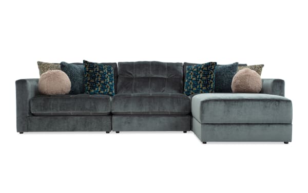 Emerald green Jewels 4-piece modular sectional sofa in glam style, polyester fabric with Bob-O-Pedic Gel Memory Foam cushions, accent pillows, and storage ottoman.