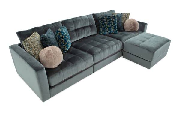 Emerald green Jewels 4-piece modular sectional with plush polyester fabric, gel memory foam cushions, accent pillows, and storage ottoman.
