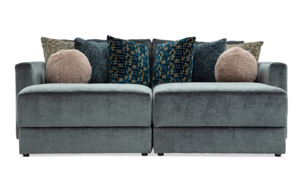 Emerald green Jewels 92'' 4-piece modular sectional with plush polyester fabric, glam style, gel memory foam, accent pillows, and hidden storage.