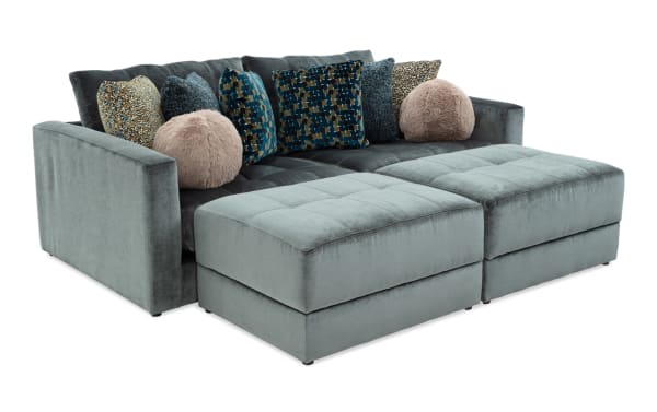 Emerald green Jewels 92'' 4-piece modular sectional with plush polyester fabric, glam style, gel memory foam, accent pillows, and storage ottomans.