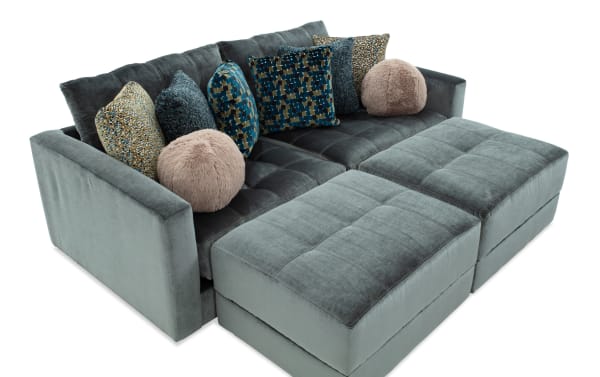 Jewels Emerald 92'' 4-piece modular sectional in green polyester fabric with Bob-O-Pedic Gel Memory Foam, glam style, accent pillows, and hidden storage ottomans.