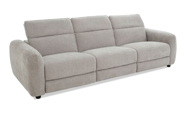 Modern three-seater sofa upholstered in light gray fabric with plush cushions, curved armrests, and a minimalist design for living room comfort.