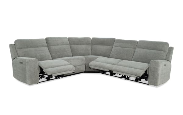 Gray fabric sectional sofa with power reclining seats on both ends, featuring plush cushioning and modern design for living room comfort.