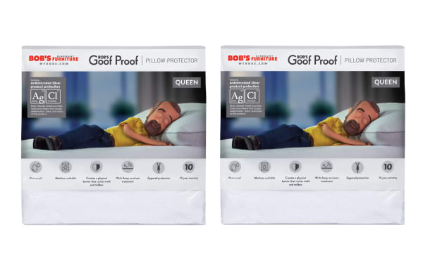 Set of 2 Bob’s Discount Furniture Goof Proof Queen Pillow Protectors in white nylon with antimicrobial silver, waterproof, machine washable, zippered six-sided encasement, and moisture-wicking cooling fiber technology for cooler, cleaner sleep.