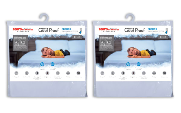 Set of 2 King Cooling Pillow Protectors by Bob’s Discount Furniture, nylon fabric with antimicrobial silver, light blue color, six-sided encasement, cooling fiber technology disperses heat 5x faster, wick away moisture, waterproof, machine washable, protects against dust mites, bed bugs, stains, and allergens.