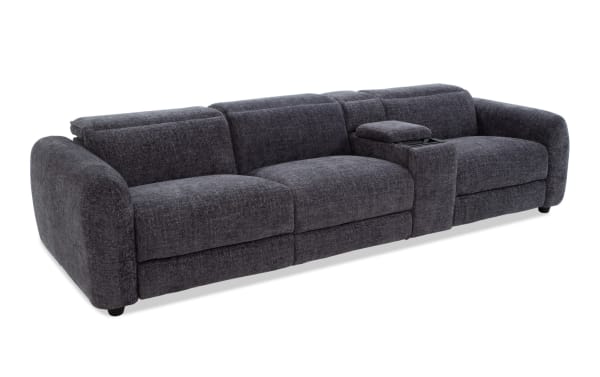 Dark gray fabric sectional sofa with plush cushions, wide armrests, and a built-in center console with storage, ideal for modern living rooms.