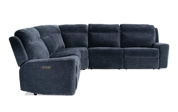 Dark blue fabric sectional sofa with plush cushioning, reclining seats, and modern design, ideal for living room comfort and style.