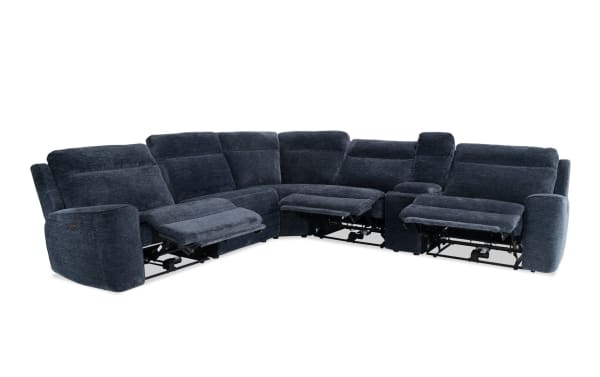 Dark blue fabric sectional recliner sofa with three extended footrests and a center console, designed for comfort and modern living rooms.