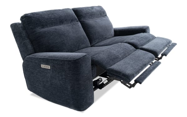 Dark blue fabric reclining loveseat with plush cushioning, padded armrests, and visible metal reclining mechanism for enhanced comfort and relaxation.