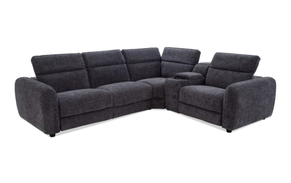 Dark gray fabric sectional sofa with plush cushions, rounded armrests, and a built-in center console for storage and cup holders, ideal for modern living rooms.