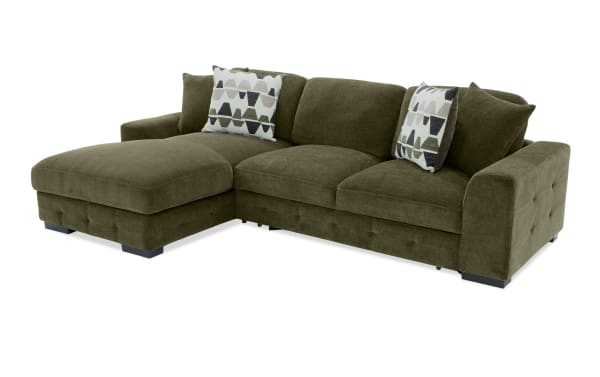 Playground Forest 116'' 2 Piece Left Arm Facing Pop-Up Sleeper Chaise Sectional in green polyester fabric with tufted detailing, oversized pillows, and storage.