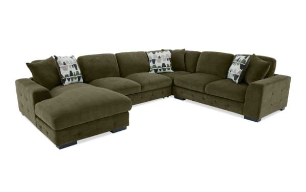 Plush green Playground Forest 4-piece left arm facing chaise sectional with armless pop-up sleeper, polyester fabric, memory foam cushions, and tufted detailing.