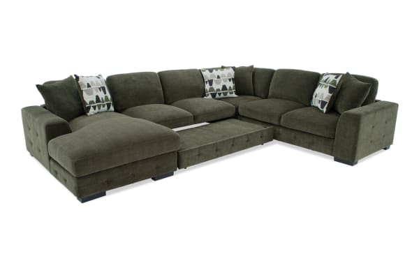 Playground Forest 145'' green fabric sectional with left arm chaise, armless pop-up sleeper, memory foam cushions, tufted detailing, and oversized pillows.