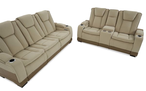 Beige and brown leather reclining sofa set with quilted stitching, cup holders, and padded armrests, designed for living room comfort and style.