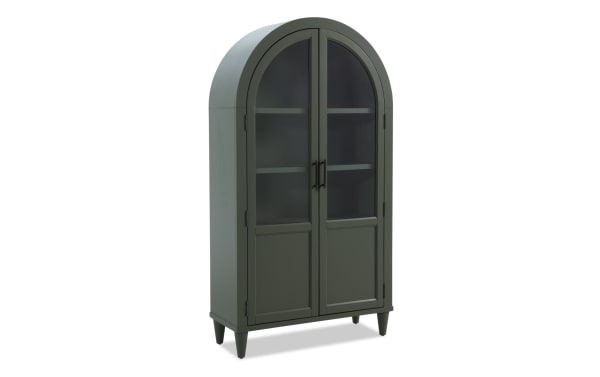 Domus Green Arch Cabinet in transitional style, made of rubberwood solids and MDF, featuring a tall, arched silhouette with glass-paneled double doors for stylish storage.