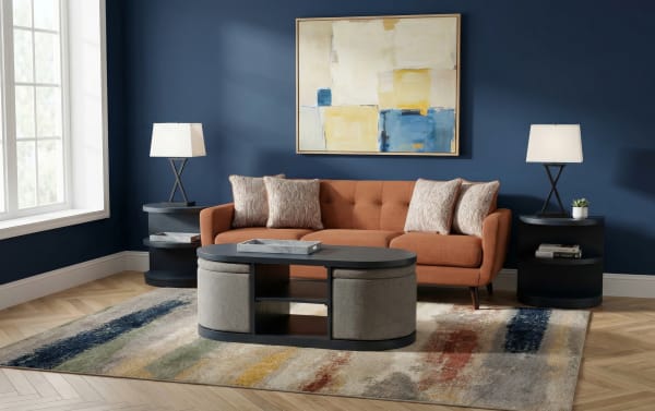 Contemporary Hampton Entertainment & Occasional black and gray oval storage coffee table set with polyester fabric nesting footrests and MDF end tables.