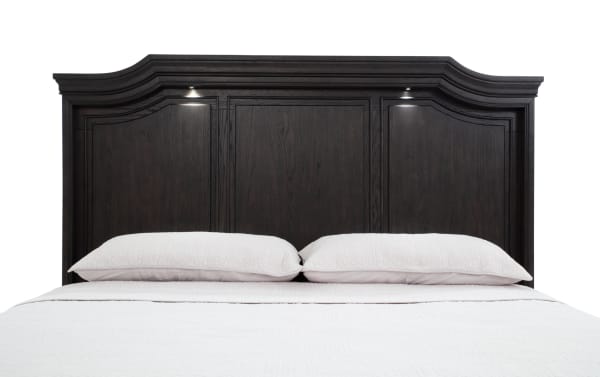 Traditional Avalon Queen Espresso Storage Panel Bed from Avalon Bedroom collection, crafted from dark rubberwood solids and veneers, featuring a curved, paneled headboard with built-in touch-activated LED night lighting.