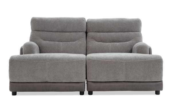 Phantom Gray 75'' power reclining dual chaise sofa in plush gray polyester fabric, transitional style with built-in USB and USB-C ports.