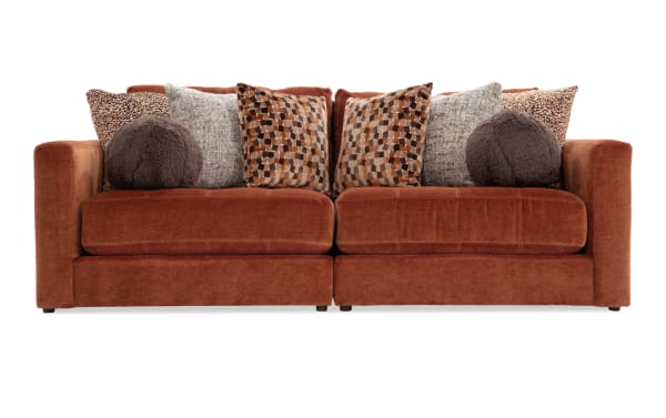 Jewels Spice 92'' 2-piece modular loveseat in orange polyester fabric with plush gel memory foam cushions, glam style, and patterned accent pillows.