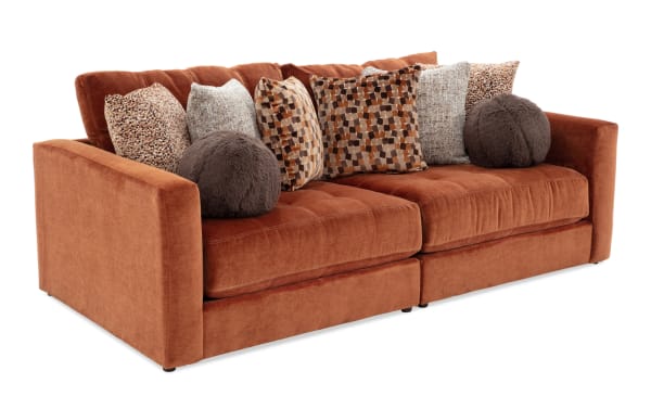 Jewels Spice 92" 2-piece modular loveseat in orange polyester fabric, glam style with plush gel memory foam cushions and patterned accent pillows.
