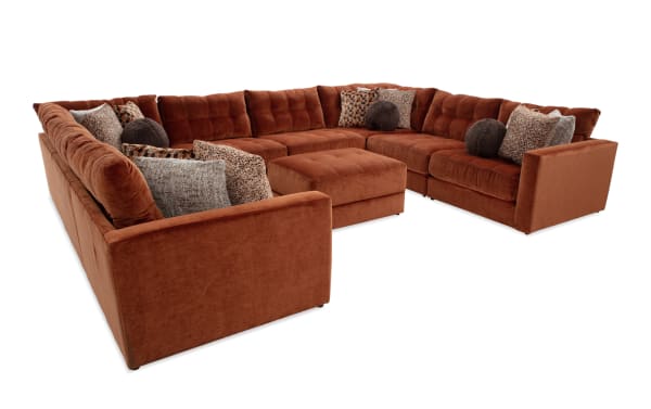 Jewels Spice 170'' 9-piece modular sectional with plush orange polyester fabric, gel memory foam cushions, accent pillows, and storage ottoman.