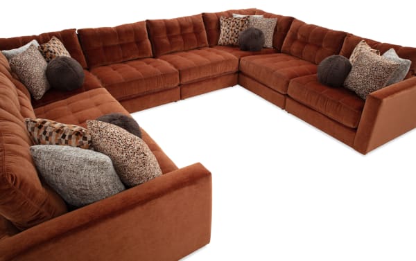 Jewels Spice 170'' 8-piece modular sectional in orange polyester fabric with Bob-O-Pedic Gel Memory Foam, glam style, includes 4 armless chairs, 2 corners, left and right arm facing chairs, and assorted accent pillows.