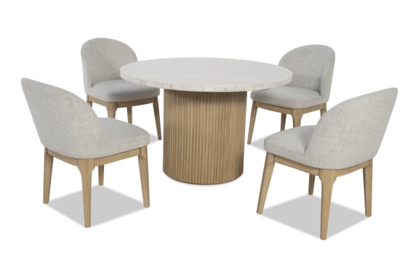 Delaney 5 Piece Natural & White Marble Upholstered Round Dining Set with light gray polyester fabric chairs, rubberwood legs, and a genuine marble tabletop in contemporary style.