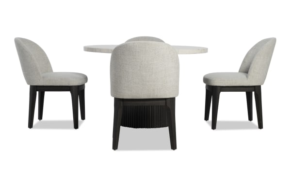 Delaney 5 Piece Black & White Marble Dining Set with round genuine marble tabletop, light gray polyester upholstered chairs, and black rubberwood legs in contemporary style.