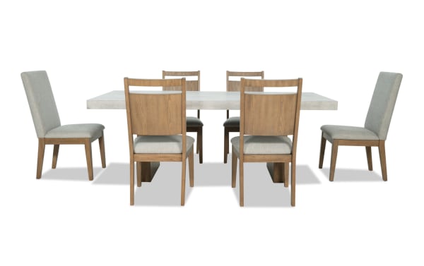 Monterey 7 Piece Natural & Gray Upholstered Dining Set with faux concrete melamine table top and six gray polyester fabric Bob-O-Pedic® Memory Foam chairs.