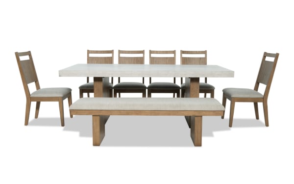Monterey 8 Piece Natural & Gray Panel Back Upholstered Dining Set with bench, gray polyester fabric, faux concrete melamine tabletop, traditional style.