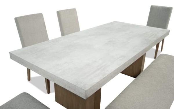 Monterey 6 Piece Natural & Gray Dining Set with faux concrete melamine table top, gray polyester fabric upholstery, memory foam chairs, and bench.
