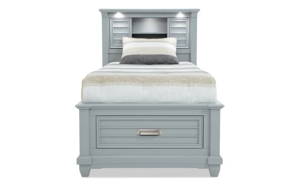 Sunset Cove Youth Twin Gray Bookcase All Around Storage Bed in coastal style with MDF frame, built-in drawers, LED lighting, power outlets, and USB ports.
