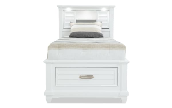 Sunset Cove Youth Twin White Bookcase Storage Bed in coastal style with MDF frame, built-in drawers, LED lighting, power outlets, and USB ports.