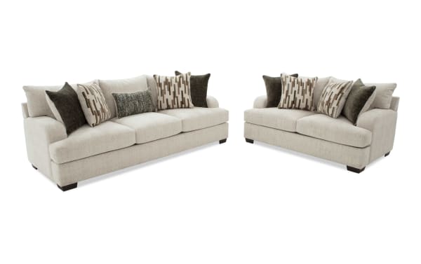 Cypress Beige 97'' sofa and 70'' loveseat set in beige polyester fabric with transitional style, plush cushions, Bob-O-Pedic® Memory Foam, and patterned accent pillows.