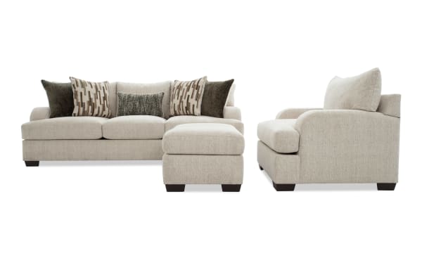 Cypress Beige 97'' transitional sofa, chair, and ottoman set in beige polyester fabric with Bob-O-Pedic® Memory Foam cushions and cozy accent pillows.