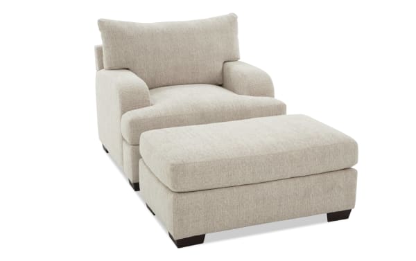 Cypress Beige Chair & Ottoman set in transitional style with beige polyester fabric upholstery, featuring plush cushions and memory foam for ultimate comfort.