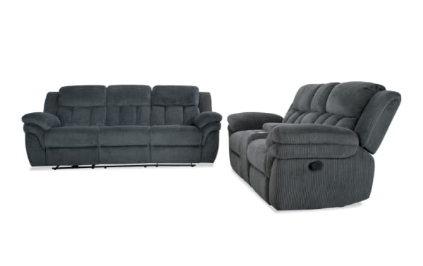 Dark gray fabric reclining sofa set with plush cushioned seats, padded armrests, and a textured upholstery, designed for living room comfort.