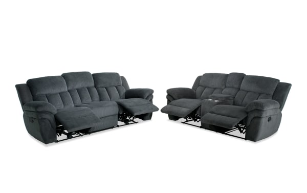 Dark gray fabric reclining sofa set with plush cushioned seats and armrests, featuring two and three-seat configurations for living room comfort.