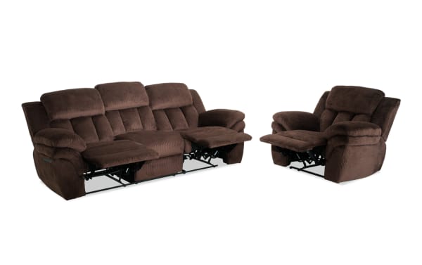 Brown fabric reclining sofa set with plush cushioning, featuring a three-seater and a single recliner chair, designed for living room comfort.
