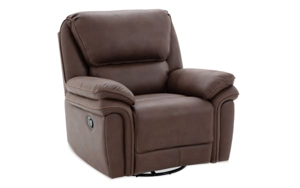 Brown leather recliner chair with padded armrests and cushioned backrest, featuring a manual lever for reclining function.